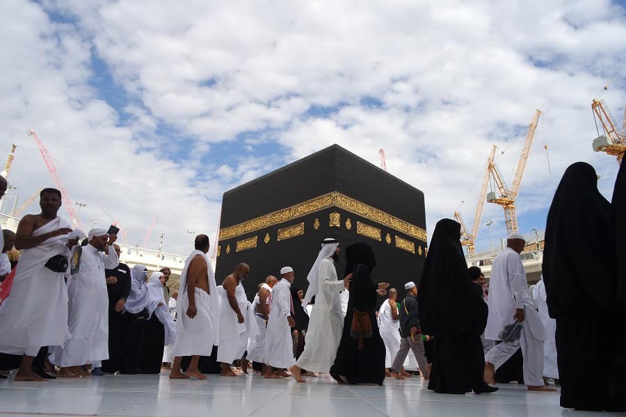 Muslim family performing Umrah together at Masjid al-Haram Makkah UK